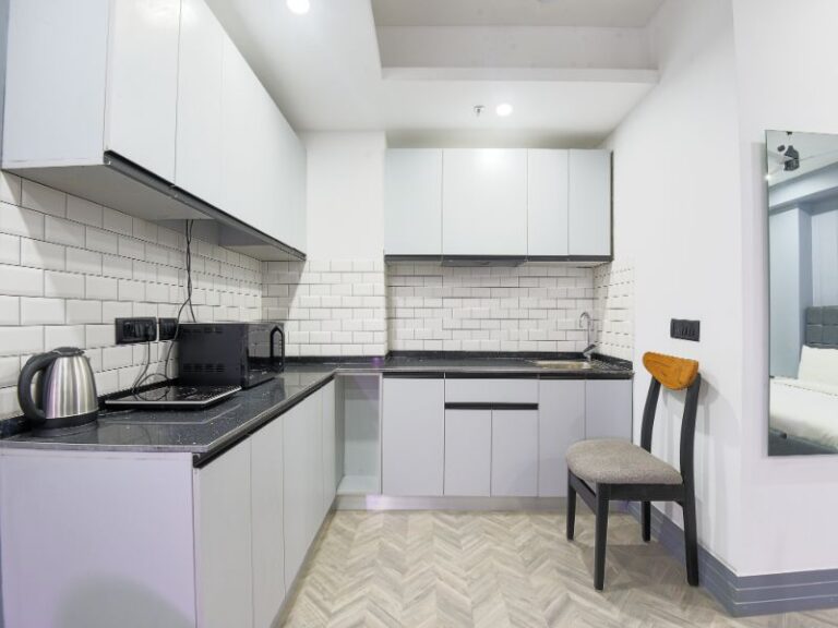 Kitchen with all equipment - Bedchambers serviced apartments MG Road